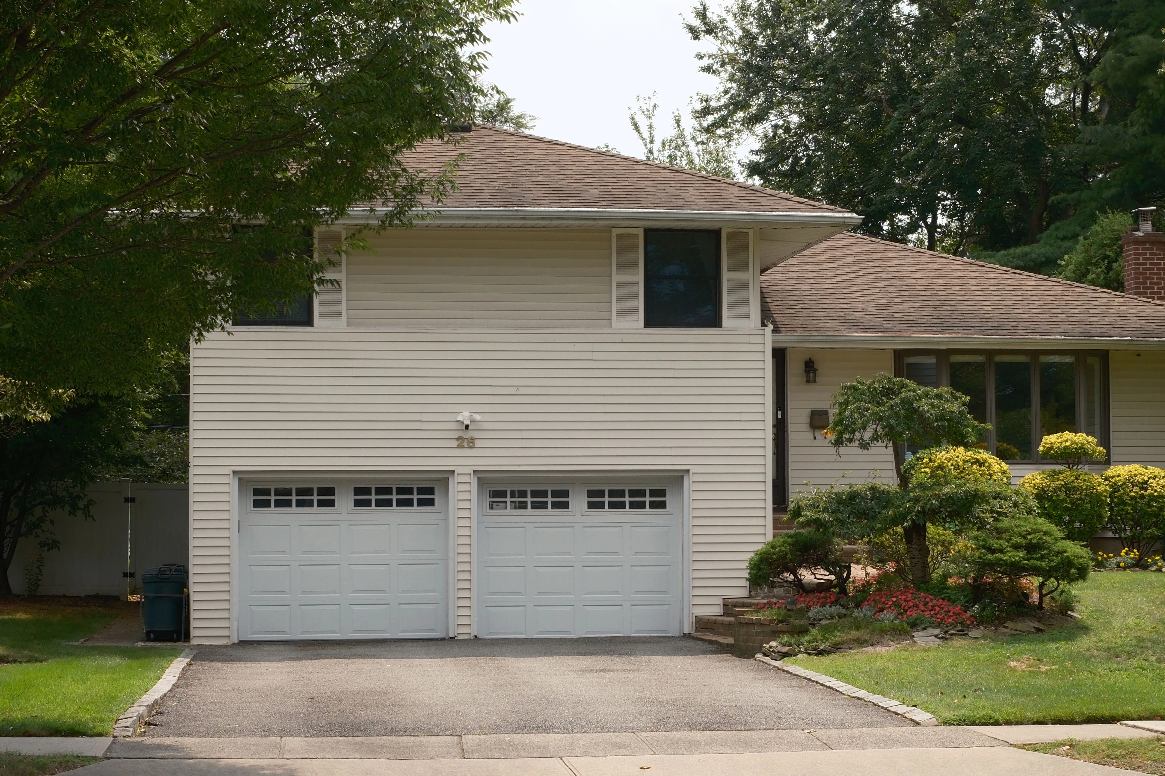 1970s Beaumont Texas home with an older residential garage door